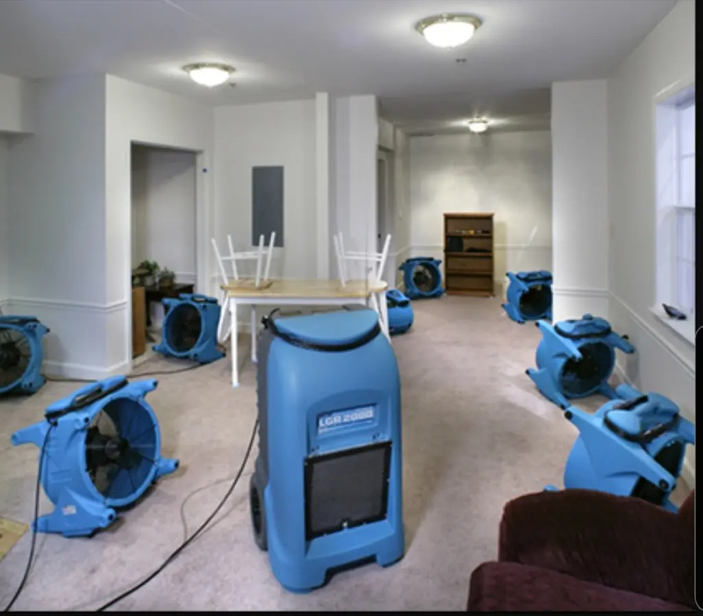 Air movers and dehumidifier setup for Water Damage Restoration in Byram
